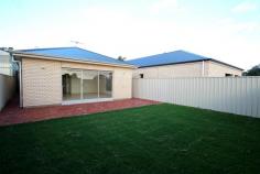 14A Henry Street, MODBURY, 5092, South Australia At your doorstep is the Tea Tree Plaza shopping centre, Tea Tree Gully TAFE , Modbury Hospital, schools and the O’Bahn bus system to the city. This
brand new well appointed home is sure to please either someone looking
for quality low maintenance living or the astute investor. There
are three spacious bedrooms, main with walk in robe and sparkling
ensuite and second and third bedrooms with built in mirrored robes. The
home boasts two living areas. Centrally located is the lounge room with
a sliding door leading out to a private paved courtyard. At the rear of
the home is an open plan family meals areas and well appointed kitchen
complete with stainless steel under bench oven, gas hotplates, range
hood, dishwasher and walk in pantry. There is a three way main bathroom and laundry with built in cupboards. The rear yard is large enough for a pet or children’s swing set and yet not too big, making it easy to maintain. Other
features include 2.7metre ceilings, steel frame construction, ducted
reverse cycle air conditioning, floor tiles throughout, garage under the
main roof with auto roller door and internal access, landscaped gardens
and paved driveway.