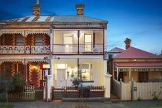 241 Victoria Street BRUNSWICK VIC 3056 An outstanding family-focused opportunity featuring secure north-facing rear and dual street frontage, 'Moulang' c1890 is a superbly renovated balcony terrace in a friendly neighbourhood near vibrant Sydney Road, Lygon Street and Princes Hill schools. A fabulous family haven with gorgeous filigreed facade and generous four-bedroom floorplan; heritage character and modern quality extend throughout this spacious Victorian residence culminating in a huge open-plan family zone overlooking secluded alfresco entertaining area and remote-control double garage (to Harris Street). Includes arched hallway, formal sitting room, living/dining area, fully-appointed stone kitchen, large family bathroom, separate laundry, heating/cooling, high classical ceilings, polished floorboards, open fireplaces, abundant storage, NBN connected and views towards the city.
