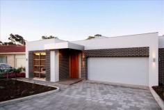 5A CARINYA AVENUE Rostrevor sa eek and stylish near new home. Located in a beautiful tree lined
avenue, so close to stunning Morialta Falls, this home has been
designed with love and attention. Light filled North facing family
room with glass doors to entertainment area. The hub of the home is a
fabulous kitchen with wide bench overlookng family/dining. Formal lounge or perhaps private study for those quiet times. Double
lock up garage with stylish panel lift doors with direct access to
home, ducted R/C air-conditioner plus security system.