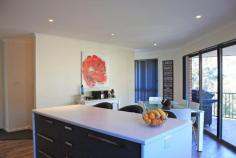 52 Branscombe Road, Claremont, TAS 7011 Nestled into a new homes area is this impressive executive style family home, full of quality appliances and sophistication. Upstairs comprises of a large living area, impressive chefs kitchen and the master bedroom complete with walk in robe and two way bathroom. Slide open the double doors and enjoy the tranquillity of neighbouring bushland from the private entertaining deck. On the lower level are the second and third bedrooms, complimented by a second living area and boasting a second bathroom with spa bath and separate shower. Also on this level is the laundry with access to the rear yard. Completing the picture is a single lock up garage with remote door and internal access, and off street parking for a further 3-4 vehicles. This is one of those homes you'll have to see to appreciate so call us today to book your private inspection of this impressive home.