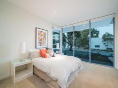 1 Brazier Grove, Kew, VIC 3101 Prestigious family residence set on a magnificent corner block of approx 443sqm, located in the exclusive Main Drive Kew Development. Offering a luxurious lifestyle and state of the art living, this home has extensive open plan living areas with a floor plan distinctively suited for family living. The ground floor comprises a formal entry, parent's retreat with built in robes and ensuite, storage, cellar and double remote control garage with access into the house. The modern staircase to the upper level is greeting you with a huge family room with floor to ceiling windows and massive lounge dining area with a cleverly designed open fireplace separating both living zones. A stunning designer kitchen features expansive stone benches and exceptional cabinetry with integrated refrigerator and freezer, built in microwave and stainless steel Miele appliances.