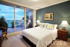 127 Beach St Port Melbourne VIC 3207 Breathtaking 270 degree bay and city views from this exceptional
Beacon Cove waterfront apartment offering the ultimate in bayside
living. Located in the most sought-after position occupying the entire
eastern end of the 11th floor, this sensational apartment offers
outstanding views from every room boasting spacious accommodation
throughout. Comprising: Security entrance, spacious north-facing main
bedroom (enjoying unforgettable city skyline views and a full ensuite
bathroom), a further two spacious double bedrooms (with walk-in robe and
study alcove), modern central bathroom, impressive open plan living
room and separate dining area opening onto entertainers terrace ideal
for alfresco living and enjoying martinis as the sun sets on those balmy
nights plus a further two large balconies. Beautifully appointed fully
equipped kitchen with sun-drenched family room and separate laundry.
Features: Two side by side basement car parks beside the lifts, large
storage cage, heating/cooling, swimming pool and live in caretaker.
Don't miss this exclusive sub-penthouse offering the most spectacular
views of Port Phillip Bay and beyond you will ever see. Only moments
away from the newly renovated Princess Pier, First Point beach, Station
Pier precinct and 109 city light rail.