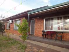 20 Pulteney Street Brahma Lodge SA 5109 3 Bedroom home on Large Block $260,000-$269,000 A wonderful opportunity to purchase this 3 bedroom home. Its positioned on a generous block measuring approximately 839m2 with no easements or encumbrances registered on the Certificate of Title. Ideally located within walking distance to local shops, school, transport and oval. The home was built in approximately 1964 and features a tiled entry, formal lounge, kitchen meals area, 3 bedrooms, 4 split system air conditioners for all year round climate control, bathroom, separate toilet, linen cupboard and laundry. The front and rear yard are fully enclosed adding privacy and extra yard space for pets or children. Outdoors there is a full length rear verandah, carport with drive through access, iron shed, a large detached 2 roomed rumpus which could possibly be converted to a self contained flat with plumbing and power already connected, as well as plenty of fruit trees. Whether you are looking to purchase an investment property or first home this property could be just what you are looking for.