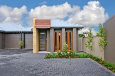 2/16 Birkalla Terrace Plympton SA 5038
Million-dollar looks and courtyard convenience minus the trendy-suburb
price tag; find all this and more in peaceful Plympton, minutes to
Glenelg beaches and Jetty Road attractions.
Designed and built by HIA award-winners, and tucked privately at the
rear of an exclusive community of three, this stunning 3-bedroom,
2-bathroom home sets the benchmark for contemporary style and low
maintenance liveability. Enjoy quality at its finest with 3-metre
ceilings, 2.4-metre Cedar doors, solid Jarrah floors, Caesar Stone bench
tops and stunning 2-pac cabinetry that will take a lifetime to fill.
There's even a separate laundry packed full of floor-to-ceiling storage!
Relax and entertain with 195m² of space, where stunning living areas wow
with open-plan ease, flowing out to fully-paved alfresco recreation
under the main roof. Enjoying the outdoors and fresh air has never been
more tempting!
Combining practicality and chic appeal, the kitchen is every
entertainer's dream. With its waterfall ends, the lovely long island
bench is a magnet for family and friends while quality stainless steel
appliances will bring out the chef in you, never missing a moment with
the mirrored splash.
Beautiful big bedrooms and indulgent fully-tiled bathrooms featuring
sumptuous Spanish basins and under-bench lighting, offer personal
sanctuaries for you and your guests including a lust-have master suite
with a walk-thru robe and pampering couple's ensuite.
And it's all brand new and only a short walk to buses, K-Mart and the local shopping centre!
Other Features:
Security alarm
Video intercom
Ducted r/c air conditioning
Premium built-in storage throughout
Auto single garage with internal entry