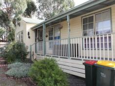6 Edols St Ballan Vic 3342 First Home Buyer / Investor - Ducted Evaporative Cooling - Gas Heating - Ceiling fans throughout - 3 Bedroom Weathertex - Build in Robes in all bedrooms - Aluminum windows with locks - Front & rear porch - Fully Fenced - Large laundry with ample storage - Gas hotplate with electric stove & range hood - Single car, carport. - Kids cubby house - Garden shed - 14 years old - 918 square metre allotment