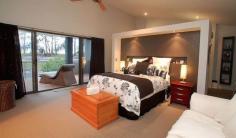 8-10 Kambah Place Reedy Creek Qld 4227 Relax and entertain with family and friends in the 9 metre salt water pool with attractive water feature and outdoor shower while enjoying complete privacy Impress all with the Italian floor tiles throughout and Italian bench tops in the note worthy German Craft kitchen with additional plumbed fridge included and glass feature screen The Spotted gum floors literally light up the whole entrance and formal living area while the sandstone on the patios enhance the beauty of a the quiet serene setting The main bedroom offers amazing storage and wonderful ensuite with spa with exceptional furnishings and mesmerising wall paper rarely seen in Australian homes