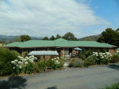 139 Saddle Road, Magra, TAS 7140 You must see this gorgeous home. It is situated on a completely private, internal, 1.38 hectare block, only five minutes from New Norfolk. The living area of the home comprising a sunroom entrance, wonderful kitchen, dining area, sunken lounge and rumpus room, is in the centre of the house. A veranda folds around the entire front of the home. The left wing has two big bedrooms with robes, a family bathroom, plenty of storage and a laundry. The parents’ wing, at the opposite end, also has two bedrooms and a lovely en-suite off the master bedroom. The home has quality fittings and is tastefully decorated throughout. Established gardens, barbecue area, a big garage, workshop and paddocks suitable for a pony contribute to making this a wonderful family residence. Call for a private inspection.