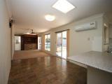22 Kentucky Crescent OXENFORD, QLD 4210 Set on 1708m2 (approx. 1/3 of an acre) in a quiet cul-de-sac in central Oxenford, this property from the street, belies the true attributes that it has to offer. 4 extra-large bedrooms with as new modern bathrooms/ensuite, a very practical layout with 2 large separate living areas plus a substantial outdoor entertaining area that bounds two & bit sides of the house thus giving shade to those sides of the house as well. The kitchen has plenty of storage and bench space, as new dishwasher, oven & rangehood and there's plenty of room to move about. It also enjoys reverse cycle air conditioning in conjunction with the adjoining, very spacious family room. There are ceiling fans throughout the house. The modern laundry is a dream - light & bright with plenty of room for the sewing machine & table as well as heaps of cupboards. There is cool, slate floors throughout with as new carpet in the bedrooms & the formal lounge/dining area. Almost 30 squares under roof, built in 1987, this home is in very good condition.
