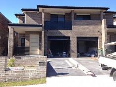 South Wentworthville NSW, 2145 Global Real Estate is offering this brand new family home four good sized bedrooms with ensuite to the main & balcony, one bedroom (study) down stair with complete bathroom, tiled living area, first floor bamboo timber, ducted air conditioning, gas kitchen with stainless steel appliances, alarm system, video intercom, rain water tank, automatic garage with internal access and a car space. Large Tiled in alfresco, Walk-in Pantry, Poly soft close door. grassed backyard and landscape garden. Close to school, shops, transport, park & all other amenities.
