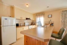 1/2 Winston Place Devonport Tas 7310 If you are looking for a quality unit in an ideal location, this unit is for you. Situated just a short walk to the Fourways shopping centre and Mersey Bluff this unit oozes quality. From the spacious sunny living area you have access via a sliding door to a beautifully paved private courtyard which is complemented by some strategically placed plants. The kitchen and appliances are in excellent condition ready for you to apply your culinary wizardry. There are two double bedrooms, both with built ins. The unit also has lots of extra cupboards for storage. Your car is well catered for with a single garage with internal access and electric door unit. If this sounds like your type of lifestyle, call Peter Colgrave today to arrange your inspection