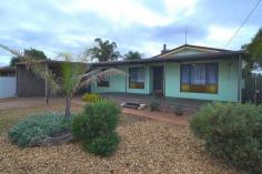 1 Wychitella Pl South Kalgoorlie WA 6430 MORE THAN MEETS THE EYE! $249,000 3 bedrooms with BIR's 1 bathroom External study/ 4th bedroom Open plan kitchen/dining area Large lounge room Freshly painted throughout Big front verandah Single carport 808sqm Corner site block Plenty of room to put a pool or shed Decked patio area to rear Close to St Josephs' Primary School, Lionel Street IGA & O'Connor IGA, Oasis is right around the corner as well as O'Connor Primary School and other local amenities Council Rates $1558.87/yr Water Rates $200.00/yr Contact Norm for more information 0418 935 980