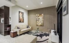 5/918 Hay St Perth WA 6000 One
word. Perfect. This chic and sophisticated inner-city apartment ticks
all the boxes where style, design and lifestyle are concerned. Located
in the “Paris end of town” – the West End, this apartment will not only
impress, but is guaranteed to provide you with endless enjoyment for
years to come. The perfect space for entertaining, the perfect
space for quiet nights in with a glass of red; Apartment Five
complements whichever mood or mode you may be in. With its 3 metre high
ceilings, polished concrete Terrazzo floors and thoughtful design, this
apartment exudes that idyllic urban look and feel and is the perfect
accompaniment to your cosmopolitan inner city life. For the savvy
investors out there, this property is currently tenanted at an
astounding rent of $850 per week. The tenant absolutely loves the
apartment and recently re-newed the lease until December 31st 2014. Boasting
a generous 83 sqm of internal living space and a large functional 13
sqm balcony, you’ll have plenty of room to spread your wings and indulge
with friends – whether it’s catered cocktail parties or intimate
gatherings, this apartment delivers. Adding to the overall feeling of
spaciousness, the open plan living area is lined with floor-to-ceilings
windows, maximising the high ceilings and making each sunset and
absolute show stopper. The spacious Master Bedroom includes
built-in full height robes with plenty of storage space and en-suite
access to the luxurious bathroom with spa bath. The second bedroom
provides ample space for multiple uses – a second bedroom, a home office
or guest bedroom for friends and family. Quality appointments
are featured throughout the apartment – they just don’t make them like
this any more. In the kitchen you’ll find gas cooking, stainless steel
bench tops, a large 6-burner Smeg cooktop (ideal for any eager chef) and
a Smeg dishwasher. Attention to detail has even been given to the
lighting, with a combination of contemporary Kreon fittings and an
abundance of quality down lights. The bathroom features a Kohler vanity,
Grohe fittings and a soft-close Caroma toilet. Further
improvements have been made to the property, including an updated ducted
reverse-cycle Fujitsu air-conditioner, stunning designer dual
roller-blinds to the living area, a sun-blind to the balcony increasing
the functionality of the outdoor space and updated shower fittings and
toilet, all adding further life to the property. Apartment Five
is one of only 30 apartments at the iconic Box Building – known for its
architectural intelligence, awards and boutique quality. Ahead of its
time when it was built, and it remains a standout inner city building to
this day. Step outside and you’ll be within walking distance to the
finest Perth has to offer – stroll along King Street and shop at Louis
Vuitton, Chanel, Gucci and soon to be, Miu Miu. Then toast the night
away at the likes of Print Hall, Bar Lafayette, Wolf Lane or the small
luxury hotel, the Terrace Hotel. To inspect this stunning inner-city apartment, please contact Danielle Geagea to arrange your private inspection.
