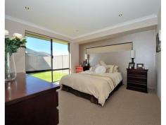 6 Chestnut Way Baldivis WA 6171 We are proud to present this lovely spacious 4 bedroom, 2 bathroom home in a great location, situated conveniently close to all of Baldivis amenities! Features include: - Attractive and private paved portico - King size master bedroom with his and hers basins in the en-suite - All 3 other bedrooms designed for double beds - Direct access into the home from the garage - Spacious titled laundry with sliding door access to the outdoors - Superb open plan kitchen with stainless steel appliances - Split system air conditioner to main living / dining and kitchen area - Low maintenance garden with landscaped limestone flower beds - Double garage with
