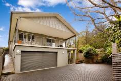78A Campbell Street, WOONONA NSW 2517 Excellent Current Rental Return The sleek and modern style of this fantastic home makes for a low maintenance and very enjoyable lifestyle. With a current rental return of $735 per week as two separate residences it is a wonderful opportunity for the investor. Situated privately on a battle-axe block this 7 year-old home is designed to embrace the lay of the land. With three split-levels, it is set up as two dwellings, one two-bedroom and one one-bedroom, both with a kitchen and bathroom. Can easily be converted back to a three-bedroom home, offering flexibility of use. - All throughout, the serene colour palette works so well with the mixed hardwood polished floors - The main bedroom is enormous and is complimented by an ensuite of equal proportions - All bedrooms have ceiling fans and built in wardrobes offering plenty of much needed storage - Bring the outdoors in with the main living and dining adjoining the courtyard - Reverse cycle air conditioning in both living areas - LG Art cool inverters - Two well appointed kitchens with gas cooking, stainless steel and white appliances - The northern courtyard is private, well planted out and is a good space for the kids to ride a trike or scooter. - Sell the mower, you won't need it, there is no grass to maintain, only well managed gardens - Take in the escarpment views through many windows or sit back and enjoy a meal on the huge front verandah - The ever-changing scenery from the verandah is enriched by a beautiful Liquid Amber tree full of colour and shade in summer and spring, full of mystique and light in Autumn and Winter - Four toilets are certainly a big benefit of this home and with a toilet in the double garage it means you can work on the car, enjoy the man space and no need to come inside! - Under the home there is incredible storage with 145 square metres of space in two lockable areas providing a fantastic dry area - An easy short walk away is either the beach or Woonona town centre - This home has just so many wonderful opportunities - With realistic owners ready to sell, make sure you don't miss your chance