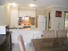1 Wagtail St Andergrove Qld 4740 It’s
all about lifestyle in this lovely villa sitting on a corner block
facing woodlands park land, featuring 2 bedrooms with built-ins, fans,
and carpet to both, the main bedroom and living areas have
air-conditioning, the kitchen is modern and well equipped with gas
stove, electric oven and dishwasher. The entertaining area is fully
covered and fenced for entertaining all year round. this lovely villa is
only 10 months old and still under builders warranty. If you’re looking
for a low maintance home and yard. This one is for you!!! • Villa • Land size 163m2 • 2 bedrooms • Built ins • Tiled living • Air-conditioning • Single garage • Covered entertaining area • Fenced For Sale $320,000 Features General Features Property Type: House Bedrooms: 2 Bathrooms: 1 Land Size: 163 m² (approx)