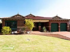 48 Fairway Circle Connolly WA 6027 Discover this polished & elegant home that offers a rare executive lifestyle. It is the ideal buy for the family in the search of space and class in a desirable suburb. Upon your arrival, you will walk pass the verandah, go through the front door and discover a polished Entry Hall. The first visible areas are the beautiful Lounge and the Dining both featuring timber flooring. Continue your journey and view the large living areas boasting high ceilings or choose to visit the spacious bedrooms. The Master Bedroom has a walk-in robe and a modern Ensuite with a supersized shower and a separate toilet. The versatile Study can be set up as a home office or converted into a 5th