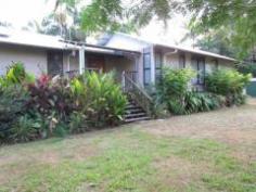 489 Gorge Road FINCH HATTON Qld 4756 Live in a lush tropical paradise amongst the rainforest in this beautifully set 5 acre property with permanent running fresh water stream and tropical low maintenance gardens. Listen and watch the running water cascade over the rocks and stones while you relax on the large under cover timber deck. This home is in excellent condition and includes 4 good-sized bedrooms, 2 with built-ins and main with W.I.R. and ensuite. Also includes a separate office and large open plan living/ dining area. The well appointed kitchen features stone benchtops, gas oven and 5 burner cooktop, dishwasher and pantry. This all opens out to the large, covered entertaining deck area. The eco friendly design boasts extra large eaves with excellent ventilation, solar hot water and solar electricity, ceiling fans and split system air-con to living and main bedroom. Two large water storage tanks and a double bay shed are also included with this property. Call for your inspection.