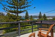 51 North Avoca Pde, North Avoca This quintessential family beach house is situated directly opposite
the surf and sand at North Avoca. Pine View is a comfortable pet
friendly house with filtered ocean views from its living spaces and main
bedrooms. Recently upgraded and freshly painted, Pine View is a relaxed
two storey holiday house which offers open plan spaces, two living
spaces each with a DVD player, two large entertaining decks, stunning
sea breezes and a huge yard for the kids or pets to play. This inviting
holiday house features a timber and beach theme throughout which adds to
its appeal. Enjoy a 10 minute walk along the sand to Avoca Beach where
you can enjoy a coffee or meal and take the kids paddle boating in the
lagoon. Pine View is a five minute drive to Terrigal beach, eateries and
shops and a 15 minute drive to Erina Fair shopping centre. On the upper
level master bedroom contains queen bed, built-in robe, deck access and
ocean views while bedroom 2 contains a double bed. On the lower level
bedroom 3 contains a queen bed, built-in robe and ocean views, bedroom 4
contains two single beds with built-in robes, while bedroom 5 contains a
tri-bunk bed.
Living space contains flat screen TV, DVD player, air conditioner, ceiling fans, views Kitchen contains a dishwasher, electric cook top, microwave, fridge, double sink Ample decks, one with sun lounge and views; other has gas BBQ, table setting for 10 Large fully fenced pet-friendly grassed yard; outdoor shower; close to cafes and shops Wi-Fi internet; ocean breezes; tasteful decor; laundry contains a washer and dryer Stylish bathrooms on both levels; main with combined bathtub/shower and toilet
