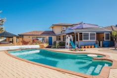 20 Clifton Gardens, KALLAROO 6025, WA **GRAND OPENING THIS SUNDAY 17th Aug 12.30 – 1.15pm**.. ……** FOR SALE
XPRESS: All offers presented Tues 26th August at 7pm**……..Set on an
expansive 1,012sqm block in a quiet cul-de-sac, this 5 bedroom, 2
bathroom plus study immaculately refurbished family home boasts
captivating Indian ocean views from the upstairs balcony.
Step inside to gorgeous marri floors via the double door entrance,
leading through to the generously sized home office that could be used
as a sixth bedroom. The expansive master suite is fit for a king and
queen and comes complete with WIR and stunning new bathroom complete
with stone bench tops and double basins, double shower with gorgeous
glass splashback and overhead rain shower.
Make your way through to the hub of the house with open plan
kitchen/dining/living overlooking the outside alfresco area. The gourmet
kitchen is sure to impress any budding master chef and features stone
bench tops, glass splashback, soft closing drawers with oodles of
cupboard space, top of the range appliances including a Miele dishwasher
and Technika stainless appliances including an in-built coffee maker.
Meander outside to the timber lined alfresco, massive pool with plenty
of space for the kids to play and gazebo area with barbecue. The kid’s
wing features 3 double bedrooms that are all bigger than many master
suites. All come complete with fitted out BIR with a second renovated
bathroom, again with stone bench tops, shower and bath with a unique
glass splashback featuring Where’s Wally and Nemo.
Upstairs you will fall in love with the theatre/games room with
fantastic bar/second kitchenette area with a gorgeous solid jarrah top, 4
integrated temperature controlled bar fridges, sink with hot and cold
water, built in shelves, glass splashback and theatre projector screen!
Featuring a guest bedroom upstairs with stunning views you simply can’t
go wrong! Ideally located in walking distance to St Marks Anglican
School, Whitfords shopping centre, Whitfords beach, the local Montague
Park with play equipment, Hillarys boat harbour and Mullaloo beach a 5
min drive and easy access to the Mitchell freeway you won’t be
disappointed.
Other features include
- Ducted reverse cycle air conditioning
- Neutral carpets and colours throughout
- Formal lounge and dining area
- Monitored Alarm system
- Huge double remote control garage with room for 2 cars and a jetski
- Reticulation throughout
- Room for parking boat/caravan
- Gas hot water system
- 4 bedrooms located downstairs with guest room upstairs
- Extra storage in roof
-
Automatic roller shutters to front of house and en suite