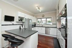 180 Odin Road, Innaloo WA 6018 Warmth, cosiness and convenience awaits you within this character-filled 3 bedroom 1 bathroom residence on a generous 462sqm corner block in very close proximity to public transport, the freeway, parks, shopping, schools, cinemas, restaurants, medical facilities and so much more. The potential is evident! Features include, but are not limited to: • High ceilings and solid Jarrah timber flooring throughout • Stunning outdoor entertaining deck with a wood fire pizza oven and a built-in six-burner gas barbecue • Spacious front lounge room with carpet and split-system air-conditioning • Renovated kitchen and dining area with a ceiling fan and a breakfast bar for meals • Quality Bosch appliances (gas cook top, dishwasher and separate oven) in kitchen • Blanco range hood and sleek white cabinetry • Large main bedroom with a ceiling fan • 2nd bedroom has a built-in wardrobe • 3rd bedroom has a robe recess and a fan • Revamped modern bathroom with a separate bath tub and shower • Rear sunroom with access outdoors and to the laundry with a toilet • Side patio for further outdoor entertaining • Lock-up outdoor storeroom • Single lock-up carport • Plenty of driveway parking • Double linen/storage cupboard • Gas hot water system • Scope to add your own personal touches throughout