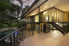 141 Mitchell Street, LARRAKEYAH, NT, 0820 A Perfect Balance Between Nature and Unique Design Integrated with the abundant tropical greenery, this is a refreshing adaptation of the classic elevated 4 bedroom home. Generous timber terraces, tropical vistas, spacious living and unique design fuse together for a delicate balance of unpretentious style, luxury and seclusion. You would be forgiven for thinking that you were in a tropical rainforest... The blend of shade and filtered light throughout the day could only be joyfully experienced by a property with such depth of established gardens. -Four bedroom, 3 bathroom home (with guest suite) -Renovated gas Kitchen -Excellent work shed -Two spacious living rooms -Resort style pool -Timber decks expanding from the internal living areas This is an attractive home and versatile - Four bedrooms, 2 bathrooms upstairs and a self contained suite, and additional living area downstairs. The glazed entry foyer, internal stairs and various timber decking blend these living spaces seamlessly. There are no property features