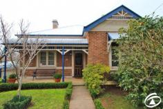 49 Byng Street, Orange Classic central double brick beauty - Steeped in history with many original features including pressed metal ceilings, original fireplaces and lead light windows - Sought after location, so close to Cook Park, cafes, restaurants, schools and CBD - Four bedrooms, 4th bedroom has gas log fire so can be formal sitting room - Large eat in kitchen with dishwasher and plenty of storage - Open plan dining and family rooms, overlooking stunning garden with northern aspect - Ducted heating and cooling plus 2 gas heaters - Great undercover patio - Double garage plus large workshop