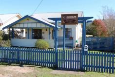 11 Church St Gloucester NSW 2422 "Coppers Hill" A convenient location is just the start of this feature packed house located opposite the police station. Aptly named “Coppers Hill” this house is currently operating as a 3 bedroom accommodation facility with the owner residing at the rear of the fully renovated premises. It can quite easily be opened up into a 4 bedroom house with 4 bathrooms. The position is great with views of the Bucketts Mountains, rear lane access and an appealing street frontage just a short walk from the shops.