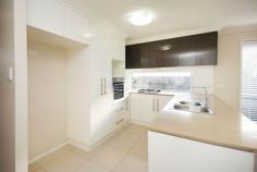 1/12a Kite Street Rangeville Qld 4350 This is ideal for those looking for the sophisticated lifestyle without comprising on location! Featuring: * Brand new duplex. Elevated position * Modern open plan with Northern aspect * Stylish kitchen. Stone bench tops. * Quality stainless steel appliances. * 2 bedrooms, both with built ins * 1 bathroom. Separate toilet * Covered outdoor area to the North * Single lock up garage. * Turn key finish. No Body Corp * Walk to parks, shops, schools & public transport. It is all about location & lifestyle!