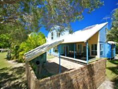 12 Marsh Street Bulwer Qld 4025 Think of your favourite summer holiday, silky white sand, gentle roar of the water, warm nights and endless views. Well now you can escape from the city to an island where crystal blue water hugs the shore, where dolphins play and the sounds of nature are truly breathtaking; for this is your very own piece of paradise, right here on Moreton Island. Where it is commonplace to see beach towels, board shorts and bikinis hanging out to dry and spending endless hours making lifelong memories with your family and friends enjoying the relaxed living areas of your 4 bedroom holiday home. Sit back with a glass of wine and listen to nature at its very best. Relax under your outdoor, covered entertainment area or watch the kids as they roam around their own tropical oasis or take a short walk down to the water. This is the perfect place for family holidays or romantic, lazy weekends with only a short ferry ride from Brisbane. - Designed to accommodate 14 visitors on family holidays and lazy weekends. - Relaxing living areas with covered outdoor entertainment area. - Holiday letting demand provides holding income. - Two minute walk to the beach. - Short ferry ride from Brisbane. Property Details Bedrooms 4 Bathrooms 2 Car Ports 1 Land Area 607 m2