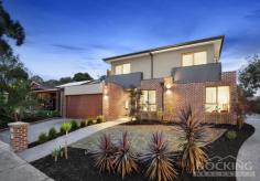 7 Tanunda Street Vermont South VIC 3133 This contemporary four bedroom plus study home still shines like new after almost three years. It dazzles with polished porcelain tiles, a magnificent Caesar stone kitchen with the Bosch appliance suite (five burner gas cooktop, oven, range hood, dishwasher), high ceilings, big living spaces and al fresco courtyard areas for relaxation and entertaining. Through the entrance hall, you’ll find the grand master with double vanity ensuite and walk-in-robe, the private study, powder room, spacious laundry and internal garage entry. With gorgeous light filtering through elegant white timber venetians, the home opens up to a dramatic main living area around the hostess kitchen. Upstairs, the bedroom wing is designed around a large rumpus room and tiled balcony, with balconies also attached to the two street-facing bedrooms, and a freestanding bath and large shower featured in the palatial main bathroom. Appointments include video security, 2000L rainwater tank, fitted robes, under stairs storage, ducted heating and evaporative cooling. Truly the epitome of style, grace, space and the essence of low maintenance luxury, there’s everything you need here to live the high life right near the beating heart of the suburb. A short stroll to the golf course, shopping hub, bus and tram terminus, Bellbird Dell and close to Vermont Secondary College, this is the private life you’ve been craving.