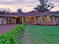 19 First Avenue, BICKLEY WA 6076.Welcome to this beautiful 1999 built FAMILY home set on the doorstep
of the delights of the Bickley Valley. Lovingly created by Scott Park
Homes with all the class and finish from an award winning builder, the
outstanding workmanship is evident throughout. You will be proud to call
the quality built house - HOME.
Inside there is plenty of room
to spread out. This property has 4 large sized bedrooms - the master
bedroom with a functional and appealing ensuite equipped with a
luxurious spa bath. The living zones are expansive - Lounge, Dining,
Family, Games/ Theatre and Meals. Under roof area is a substantial
266sqm in total. Outside you have a good sized, easily accessible workshop, lawned area plus extensive patio surrounding 2 sides of the home. What
a HOME this is, within minutes to Kalamunda and its myriad of services
and highly regarded Schools and Colleges in Bickley, Carmel and
Lesmurdie. Close to Welshpool Road for great access to the Airports and
Perth City. For Private Inspection call Joanne Pottinger 0419 903 548. Property Features include: 1999 built, double brick and tile SCOTT PARK home 4 bedrooms and 2 modern bathrooms Main bedroom with Bay window, retreat plus spa bath Living areas: Formal Lounge, Dining, Family, Meals and Games/Theatre Gas cooking with a high bench topped kitchen, Bosch dishwasher 2 x Split system air-conditioners and wood heater Double Carport plus ample extra parking Drive through access to 6m x 5m workshop Private fully fenced 1386m block
Property Summary
Type: House Bedrooms: 4 Bathrooms: 2 Garage: 2 Open Parking: 2 Lot Size: 1386 sqm
