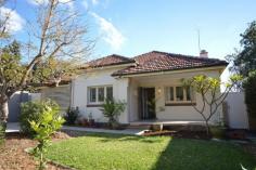 267 Curtin Ave Cottesloe WA 6011. It's evening, the end of a long day and you can finally relax, you climb into bed and stretch, the breeze carries the scent of the pine trees, you close your eyes and as you slip into a dream you smile, you can hear the ocean. This enchanting cottage provides a wonderful entry into the most exclusive beach side suburb of Cottesloe. Fully refurbished with polished timber floorboards, high ceilings with ornate cornices and ceiling roses, lead light glass windows, and charming cottage gardens. The formal lounge has a log gas fire in the original mantle enclosed fireplace, the modern kitchen is fitted out with Tilly’s overhead pendant lamps, Bosch induction cooktop & double ovens, Schweigen extractor system and DuPont bench tops and 3 large bedrooms, a refurbished bathroom and separate laundry, water closet and sleep out round out the accommodation. There is a separate single lock up garage that provides rear parking off the lane as well as car parking at the front entry to the property behind a metal pressed automatic