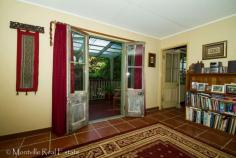 21 Kondalilla Falls Rd Flaxton QLD 4560 Artistic use of recycled building materials has resulted in a unique home with loads of character. The
spacious cottage of 2 bedrooms plus study, features recycled French
doors opening onto the terrace of the living room plus custom made
cabinetry in the kitchen, laundry, bathroom and bedroom. Fully tiled
throughout, the cottage sits privately on an 811m2 fully fenced block
with a rustic pergola nestled amongst the established trees. The property is close enough to walk to the National Park, close to the bus stop and a short drive to the shops. Inspections are recommended Features Terrace/paved Pot-belly stove Safety Switch Fenced Smoke Alarms Property Details Property Type: House Bedrooms: 2 Bathrooms: 1 Garages: 1 Land Area: 811m2