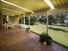 9 Olen Close Wooli NSW 2462
This quality built home right on the Wooli River is a must to
inspect. Well designed, the 2 living areas, kitchen, veranda and master
bedroom all have extensive river views.
The home features:
* 4 good sized bedrooms and 2 living areas
* 3 executive bathrooms (2 corner baths, 3 showers and 3 toilets)
* Full length paved undercover entertainment area
* Formal entry, spacious kitchen, carpet throughout lounge and bedrooms
* Double garage & established gardens
The land is level, fertile, private and priceless. Approximately 1008
sqm of pure riverfront land is yours for swimming, boating, fishing or
just relaxing and watching the water go by. Only one neighbour to the
west alongside the river and parkland reserve. At the end of a quiet
cu-de-sac this is comfortable, confident, commodity buying at its best.
For Sale
$695,000