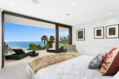 4 Wolaroi Crescent Tamarama NSW 2026 Perfectly suited to its glamorous Tamarama address, this new architect designed residence makes a bold statement in coastal living, with captivating beach and ocean views forming a spectacular backdrop to a resort inspired indoor/outdoor lifestyle. Flawless home showcases premium, state-of-the art design. Multiple living zones extend seamlessly to stunning terraces; poolside entertaining area with built-in barbecue and daybed; deluxe kitchen with Ilve double oven, Liebherr refrigeration; indulgent, entire floor master retreat overlooking the beach; private double bedrooms with custom robes and terrace access; luxurious Travertine bathrooms featuring underfloor heating; ducted/zoned air conditioning, C-Bus system, integrated sound; huge double lock-up garage plus additional secure car spaces; metres to Tamarama Beach and Bondi-to-Bronte coastal walk.