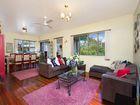 172 White Street Graceville Qld 4075 683M2 LEVEL ALLOTMENT OVERLOOKING PARKLAND, SPACIOUS THREE BEDROOM HOME, POLISHED HARDWOOD FLOORS THROUHOUT FOR SALE NOW - OPEN HOUSE SATURDAY 23RD AUGUST 1:00PM - 1:30PM Don’t miss this fantastic opportunity to secure a blue chip Graceville address! Overlooking tranquil Giraween Park, this highset three bedroom home is ideal for the growing family with polished floors throughout, large kitchen, spacious living, an elevated outlook and a large level 683M2 allotment. With close proximity to bus routes, riverside parkland and bikeways, only a short stroll across the park to Graceville Riverside Village and Gym and located within the Graceville School catchment, this property is supremely positioned.