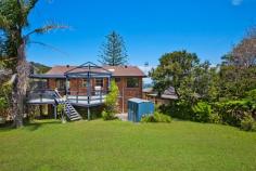 51 North Avoca Pde, North Avoca This quintessential family beach house is situated directly opposite
the surf and sand at North Avoca. Pine View is a comfortable pet
friendly house with filtered ocean views from its living spaces and main
bedrooms. Recently upgraded and freshly painted, Pine View is a relaxed
two storey holiday house which offers open plan spaces, two living
spaces each with a DVD player, two large entertaining decks, stunning
sea breezes and a huge yard for the kids or pets to play. This inviting
holiday house features a timber and beach theme throughout which adds to
its appeal. Enjoy a 10 minute walk along the sand to Avoca Beach where
you can enjoy a coffee or meal and take the kids paddle boating in the
lagoon. Pine View is a five minute drive to Terrigal beach, eateries and
shops and a 15 minute drive to Erina Fair shopping centre. On the upper
level master bedroom contains queen bed, built-in robe, deck access and
ocean views while bedroom 2 contains a double bed. On the lower level
bedroom 3 contains a queen bed, built-in robe and ocean views, bedroom 4
contains two single beds with built-in robes, while bedroom 5 contains a
tri-bunk bed.
Living space contains flat screen TV, DVD player, air conditioner, ceiling fans, views Kitchen contains a dishwasher, electric cook top, microwave, fridge, double sink Ample decks, one with sun lounge and views; other has gas BBQ, table setting for 10 Large fully fenced pet-friendly grassed yard; outdoor shower; close to cafes and shops Wi-Fi internet; ocean breezes; tasteful decor; laundry contains a washer and dryer Stylish bathrooms on both levels; main with combined bathtub/shower and toilet