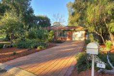 11 Waratah Court, WEST BUSSELTON WA 6280 Located in the exclusive Kalgaritch Estate, close to schools, Leisure Centre, and a short drive to the pristine waters of Geographe Bay and downtown Busselton. This country style home sits on a whopping 2,988 m2 block at the end of a cul-de-sac and would be an ideal home for any family. The property consists of two brick and tile buildings, an 8x8 shed with an annex ideal for a caravan or boat and an underground swimming pool. Outdoor living at its most enjoyable! The main house boasts open plan living with a wood burning fireplace, reverse cycle air conditioning and vaulted ceilings in the kitchen, dining and family room all overlooking the expansive gardens. The master bedroom with en suite and walk in robe, accompanies two minor bedrooms with built in robes and a main bathroom and WC. A separate theatre room and study complete the picture. Step across a covered walkway from the main house to the second building overlooking the swimming pool which is perfect for entertaining or could be a 4th bedroom, kids retreat, artist's studio or home office...the possibilities are endless. There is also a second WC and laundry utility room. Enjoy the warmer weather relaxing under the north facing gabled patio, overlooking the expansive gardens, which are a horticulturist's haven showcasing native bush land, room for a great vegie patch, citrus grove, or stone fruit orchard and open space all enticing the kids to adventure. Don't wait - this one is a gem and won't last long!