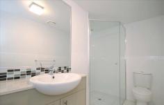3/51 Elizabeth Street, Toowong, QLD 4066 Main bedroom has ensuite and sliding doors out to patio. Light & airy open plan living area which also opens out to a spacious tiled patio. Conveniently located less than 5 min drive from the Toowong Village and train station and public transport available to get you to the City and Brisbane River. • Built ins • Dishwasher • Internal Laundry • TV & Internet connections • 2 separate garages with remote controls • Quiet location – 1 of 5 units in complex