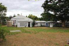 1 Old Toowoomba Rd One Mile QLD 4305 ATTENTION INVESTORS - Large 981m2 corner block zoned Character Mixed Density in high profile position with an average of 20,000 vehicles passing each day. Large prominent sign erected on the corner of this block was returning $220 per month until recently. Long term tenants in place paying $295 per week (including lawn maintenance). The home is solid and straight, sits on concrete stumps on a large corner block. There is loads of character and even more potential. Those willing to put in a bit of elbow grease will reap the rewards. * Solid character home on concrete stumps * Two large bedrooms plus sleepout * One bathroom needs attention * Large open plan formal lounge & dining * Second separate living area off kitchen * Large eat-in kitchen needs attention * VJ walls, polished pine floors, picture rails & wide skirting throughout * Large rear yard with direct access off side street This property has great commercial prospects (STCA) with its large vacant SIGN, main road frontage and proximity to parks, tennis facility (across the road), sporting grounds (across the road), swimming pool etc. Features Fenced Verandah Safety Switch Balcony Smoke Alarms
