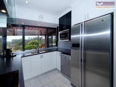 16DalwoodRdSwanViewWA 6056 IF YOU LOVE ENTERTAINING AND OUTDOOR LIVING, THIS HOME SHOULD BE ON TOP OF YOUR LIST OF PROPERTIES TO VIEW. The presentation of this home is an absolute credit to the owners and so are the available features. At approximately 150 sqm, this home has the largest rear timber deck I have ever seen and would easily cater for 100 plus guests in comfort. There is plenty of space for the spa and the largest outdoor kitchen. Entertaining at night gives spectacular views towards the Darling Escarpment in the distance as it lights up at night. The key attributes that will deliver you the lifestyle you have been searching for include: -Versatile floor plan allows for the home to be 4 bedroom plus study or 5 bedroom. The floor plan canalso be used as a Granny flat or teenage pad. -Brand new high gloss white kitchen with contrasting high gloss black doors, all slow closing, metallic glass splash backs, ample under bench andoverhead cupboards, 6 large pot draws, stainless steel look kick panels, quality stainless steel appliances and a large pantry. -A handy kitchen serverywindow allows direct service to the rear deck and the kitchen also boast great views whilst washing up. -Multiple large separate living spaces. -Thoughtfully renovated bathrooms. -Plenty of parking available. -Very low maintenancegardens throughout. -Arguably one of the best streets in Swan View and is surrounded by. Other quality homes. To book an inspection of 16 DalwoodRoad, Swan View or advice on any of your realestate needs please feel free to contact Brad Errington