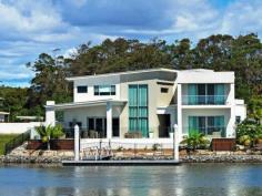 1012 Edgecliff Drive Sanctuary Cove Qld 4212
For Sale
Stunning modern home - Executive home with study near front entrance.
Features Include:
* Cathedral ceilings
* Media room fully equipped
* 4 en-suited bedrooms will robes
* Separate powder room
* Polished timber floors
* High glass windows and doors open onto outdoor entertaining patio
* Kitchen with granite benches and butler's pantry
* 2 Master bedrooms - one downstairs and one upstairs
* Huge open plan living, dining and family area
* Glass balustrade to upper level with amazing staircase
* 3 bedrooms upstairs
* Master with lovely en-suite and balcony
* Large games room
* Pontoon and close to main river
* Entertaining area with sauna and covered built in BBQ area
Sanctuary Cove has been awarded Australia's first Five Gold Anchor
Residential Canal Estate Marine accreditation - one of only two such
accolades in the world.
THE ULTIMATE LIFESTYLE – THE BEST RESIDENTIAL RESORT IN AUSTRALIA – AN ENVIABLE REPUTATION
When buying a home in Sanctuary Cove it is not like buying a home
anywhere else. There are no comparable locations on the Gold Coast, if
not Australia. It will never be replicated. It is buying a LIFESTYLE and
a way of life that is the envy of everyone. There is a whole community
behind the gates – you can walk, ride your bike or take a buggy. Amuse
yourself the whole weekend without even leaving the resort.
Sanctuary Cove is a resort-style master planned community featuring
two 18 hole championship golf courses, a 300 berth marine, Hyatt Regency
(with exclusive use by all residents) and Country Club. There is no
other place that offers such a safe, peaceful, wonderful and ultimate
lifestyle for all ages.
The very nature of Sanctuary Cove and the wonderful friendly
community spirit provides residents with the ultimate lifestyle. There
is more to the Cove than in these notes, including special travel
arrangements for school children, bus services, mobile library, twice
weekly rubbish collections even with bins deodorized, lined and returned
to your property, garden and street maintenance, postal and news
deliveries, even PETS ARE WELCOME.
SECURITY
Sanctuary Cove offers its residents 24 hour active land and water
‘back to base’ security services providing the peace of mind we are all
striving for. All security personnel are CPR qualified.
INTERNATIONALLY RENOWNED GOLF COURSES & COUNTRY CLUB
The Pines Golf Course and the newly renovated Palms Golf Course
offer contrasting styles and premier design and are widely regarded
among Australia’s elite players. The absolute ultimate for any golfer,
plus of course all the excellent associated facilities, professional
tuition, pro shop, driving range, putting greens and a magnificent
environment in the new $13 million dollar Country Club which also offers
a full fitness centre, tennis courts and a 25 metre swimming pool,
beauty treatments and massage rooms.
MARINE VILLAGE
As short buggy ride away is The Marine Village – the heart of
Sanctuary Cove - located on the edge of a tranquil harbour it is home to
a variety of cafes, bars, restaurants, Yacht Club, medical centre,
dentist, lawyer, pharmacy, bank, newsagents and specialty shops.
SANCTUARY COVE MARINA
The Marina is a world-class facility offering personal berthing
services and facilities. The wide-berth design provides over 300
moorings for both large and small vessels. The Harbour Master provides
premium unleaded and diesel fuel plus bait, ice and seafood fresh from
the trawler.
LOCATION
An easy 45 minute drive from Brisbane and only 20 minutes from the
Gold Coast beaches. Also only 40 minutes from Queensland major airports.
Sanctuary Cove has direct access to the Pacific Ocean via the protected
waterways of the Gold Coast Broadwater and the Coomera River and is
only a short boat ride away from South Stradbroke and Wavebreak Islands.
FOREIGN INVESTOR – FOREIGN INVESTMENT REVIEW BOARD
Sanctuary Cove has FIRB classification which allows overseas investors to purchase property.
