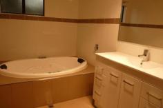 31 Hockey Place West Beach WA 6450 From the cul-de-sac seclusion of this elevated property, achieves views by day and the town lights by night. This spacious 4 bedroom, 2 bathroom home with large open living area, cathedral ceilings, big tile fire and air-conditioning. Modern bathroom with 2 person spa bath and water filtration unit for drinking water. Viewing veranda opens to a cool patio. Included is a studio room, garage and reticulated surrounds.