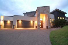8-10 Kambah Place Reedy Creek Qld 4227 Relax and entertain with family and friends in the 9 metre salt water pool with
attractive water feature and outdoor shower while enjoying complete privacy
Impress all with the Italian floor tiles throughout and Italian bench
tops in the note worthy German Craft kitchen with additional plumbed fridge
included and glass feature screen The Spotted gum floors literally light
up the whole entrance and formal living area while the sandstone on the patios
enhance the beauty of a the quiet serene setting The main bedroom offers
amazing storage and wonderful ensuite with spa with exceptional furnishings and
mesmerising wall paper rarely seen in Australian homes