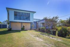 26 O'Brien Esplanade, SHOAL POINT, QLD 4750. Located at the iconic Shoal Point look out is this older style two
storey beach house. The previous owners had lived here for the past 50
years and it is only due to the property becoming part of the deceased
estate that it has come on the market. Rarely do homes come up for the
sale in this picturesque location and if they do they don't last long. Some of the many features of the property are: - Views of the ocean from the top level of the two storey beach house -
Lower level is set up as a 2 bedroom cottage with kitchen, dining and
lounge area plus bathroom, toilet and room for 3 car accommodation under
the main dwelling - Top level of the home has an open plan lounge, dining and second kitchen area which adjoins the glassed in verandah - Also on the top level there are 2 more bedrooms, a utility room, bathroom and second toilet - Only a minutes walk to two separate beaches or just sit at the lookout and take in one of the most captivating views in Mackay This
home does need some TLC or if the new owners want to remove it and
build their dream home then it would be well worth the investment.
Location is something that's hard to put a price on, so if you have a
chance come and have a look at 26 O'Brien Esplanade and you can see it
for yourself.