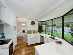 4 Calder Way Bateman WA 6150 FIXED DATE SALE - To be sold on or before 21st August 2014. Fresh, presented "as new" thanks to a stunning makeover. An exciting easy care home with all the right essentials required to enjoy an outstanding lifestyle in highly sought after Bateman which is close to a vast array of amenities. The home boasts a stunning brand new kitchen and bathrooms, solid timber floors a spacious outdoor patio, fresh landscaped gardens with plenty of space for a dog and a pool or kids to run around. The home has striking street presence with a modern contemporary new rendered facade and roof colour upgrade.