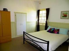 WOODENBONG, NSW 2476 This beautiful cottage is located in the township of Woodenbong, under 1.5hrs to Brisbane, Gold Coast and Byron Bay. Positioned in a high spot in town, it has magnificent views to the surrounding Border Ranges. Features Include: - Three bedrooms, two with built-ins - Timber floorboards - French doors opening onto the front and rear deck areas - High ceilings with original horizontal timber wall boards - Intricate timber fret-work throughout - Large bathroom with shower and bathtub - Open plan kitchen and dining area - Combustion wood fire to keep you warm in winter - Single lock up garage - Quarter acre allotment