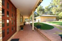 205 patrick pl mundaring WA 6073. If
location is important look no further than this beautifully presented
quality 5 bedroom 2 bathroom b+t solar efficient family home in
Mundaring. Lovely, bright, modern and welcoming internal accommodation
with high ceilings, superb kitchen and quality finish. Set on a 1 acre
block at the end of a peaceful cul-de-sac, all the work is done, just
move in and enjoy. • Walk to school, shops and public transport • Main bedroom en-suite and walk in wardrobe. • 4 further good sized bedrooms all with built in wardrobes. • Large family bathroom, spa bath and shower enclosure. • 3 living areas, family, games and parents retreat/study • Large oak kitchen with integrated larder unit, Belling Sterling chefs stove. • Blackbutt flooring to main living areas. • Fully fitted laundry room. • Huge 10.5m x 6.5m outdoor entertaining area (with café blinds). • Below ground salt water pool with solar pool heating. • Evaporative ducted Air-con. • Remote split system to main living area. • Edwards solar hot water with electric time clock boost. • Slow combustion wood stove with domestic hot water heating. • Solar electric panels . • Detached powered b+t double lock up garage/workshop, plus parking space for 6 cars. • Landscaped lawns with fully automatic retic. • Fully insulated roof void (fibreglass) • Established fruit trees and prolific passion fruit vine. Nearest Schools:
Mundaring Primary School, Mundaring Christian College, Mt Helena
Primary School, Eastern Hills Senior High School, Sacred Heart Primary
School, Parkerville Primary School, Helena College Senior School.