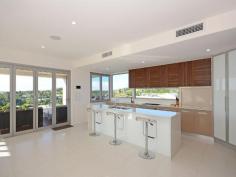 13 Coogera Court, Dundowran Beach, QLD 4655 From the moment you enter this exclusive street you will be impressed with the visual presentation of this 2014 design award winning exclusive residence. This innovative 4 level property has so many features that the following is only a sample of what’s on offer. FIRST LEVEL 2 Car garage, gym with air-con, laundry and linen storage. SECOND LEVEL Modern kitchen with Caesar stone tops, Smeg appliances, spacious open plan living, covered balcony with amazing views, trendy sunken pool, BBQ area, guest/rumpus with adjoining bathroom (can be fifth bedroom) shower and toilet as well as a toy storage room or maybe a fifth bedroom. THIRD LEVEL Home office/study, if you want to work from home this is just the ideal office, the views are awe inspiring, just in case you need the extra motivation. FOURTH LEVEL Contains all of the bedrooms, the main bedroom has an ensuite, WIR plus a custom Italian spa and once again great vista’s. The other 3 bedrooms have robes plus access to the 3rd bathroom. If you like quality then you will be aware of product names like Methven, Oliveri and Smeg which are featured throughout, some of the other features include semi polished Italian porcelain floor tiles, satin finished Tasmanian Ash flooring, ducted and split A/C, computer friendly home (data cabling throughout), in built gas BBQ, gatehouse with remote electric gate for security. Nothing tells a story better than a photo, these photos tell it all. If you’re looking for a ‘no expense spared’ secure home, look no further! Please call to book an inspection to view all of the other great features of this amazing property.