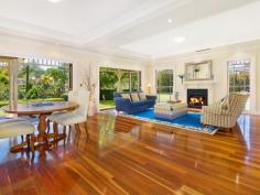 11 Carson Street Pymble NSW 2073 Ideally set in the Pymble exclusive east side "Golden Triangle" dress circle, cul-de-sac setting, just a 650m stroll to rail and village. One of Pymble's esteemed estates, this prized full brick residence, offers the perfect combination of grand scale living and entertaining. Privately positioned amid North facing landscaped grounds of 2737sqm, with approved subdivision for 2 titles. Capturing panoramic botanical views this family home has classical inspired interiors, offering a choice of living zones flowing to outdoor spaces.